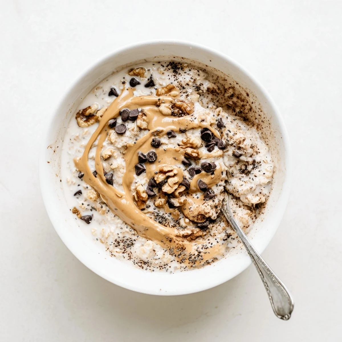 Soft, soaked oats and mini chocolate chips make this Cookie Dough Overnight Oats breakfast extra comforting and rich.