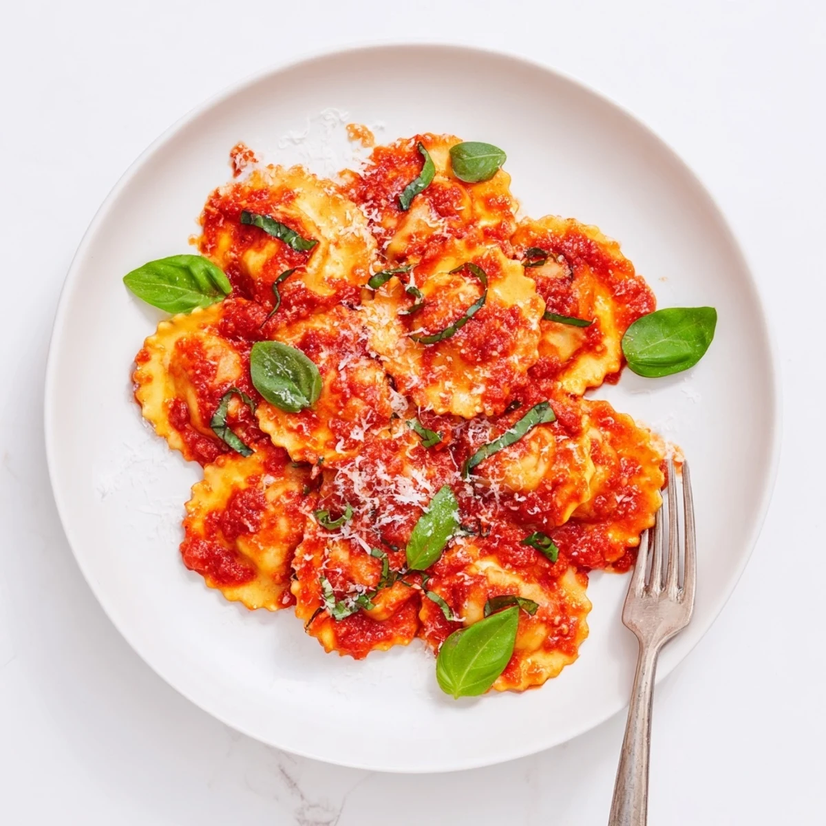 Steaming 20-Minute Ravioli with Simple Sauce in a ceramic bowl with a fork, ready for a quick weeknight dinner.